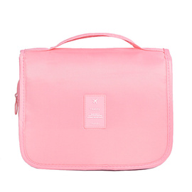 Różowa damska kosmetyczka podróżna
